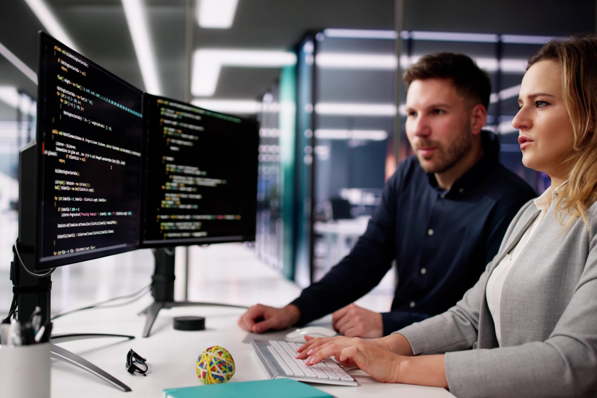 Coder,Using,Computer,At,Desk.,Web,Developer